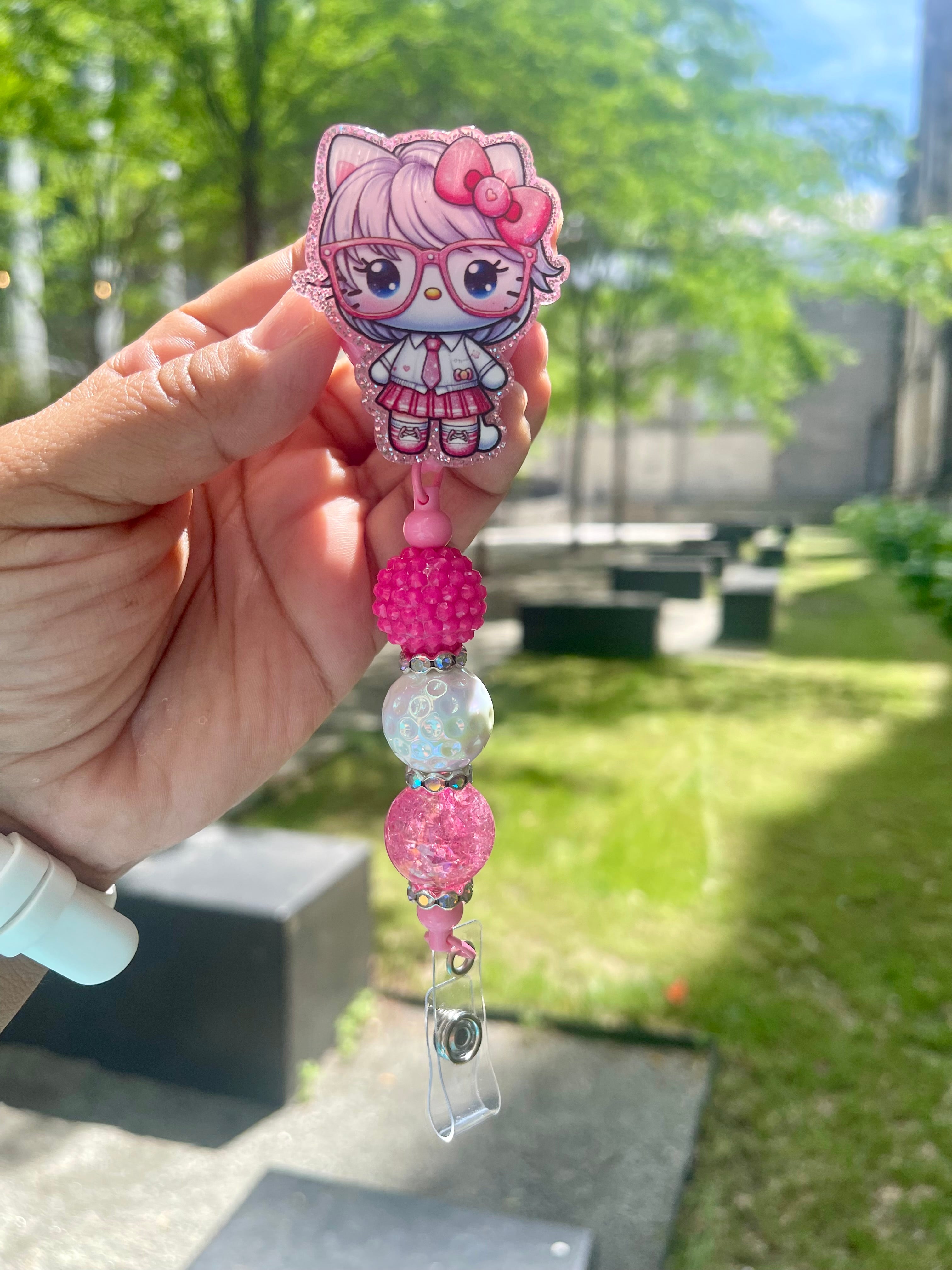 Hi Kitty w/pink glasses Badge Reel